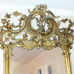 Refinishing Antique gilded carved mirror before